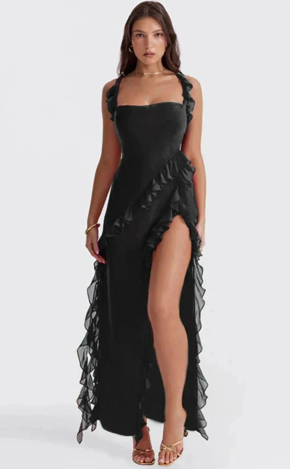Burgundy Sylvia Ruffle Maxi Dress with square neckline, ruffled straps, and a high slit with cascading ruffles.