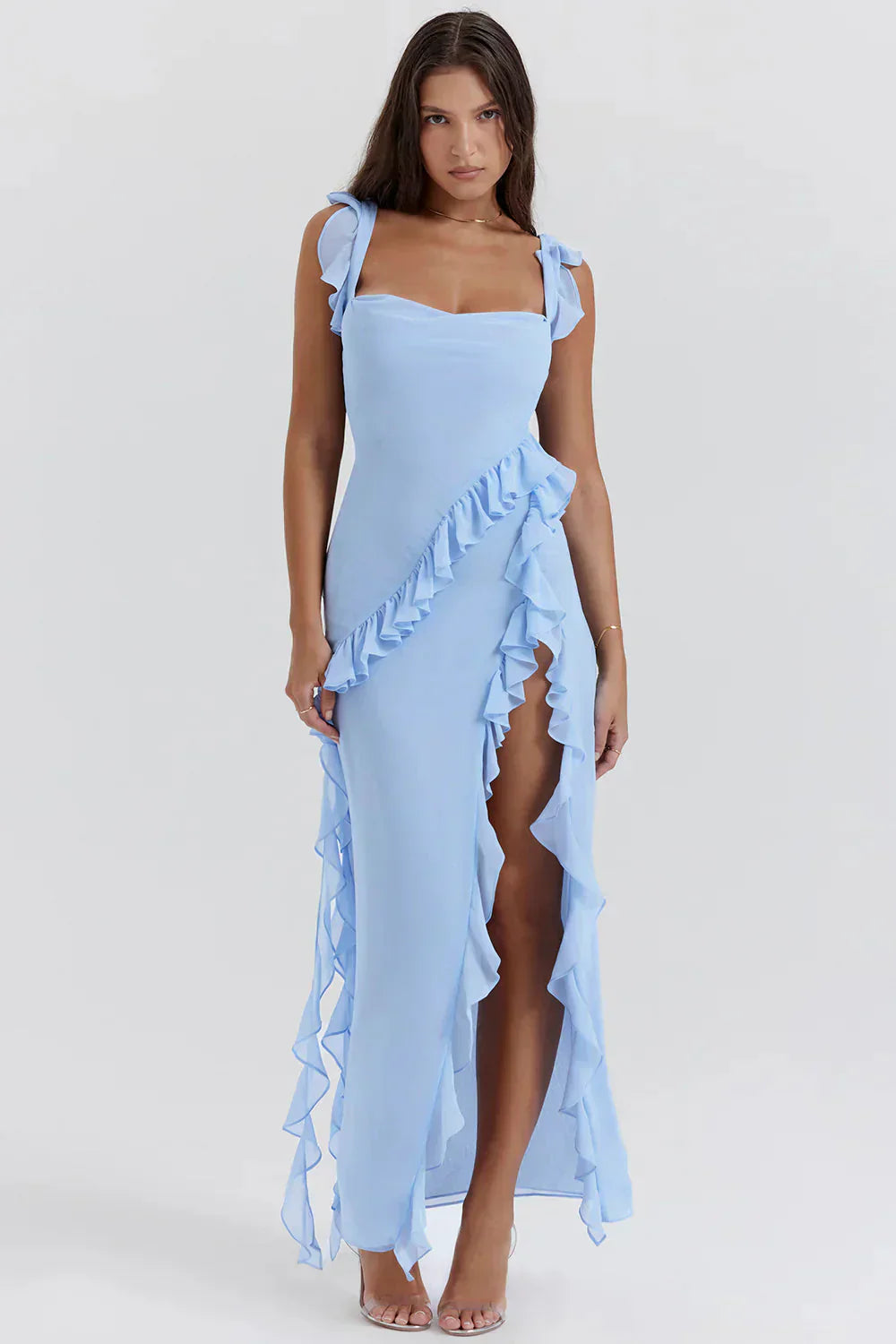 Light blue Sylvia Ruffle Maxi Dress featuring a square neckline, ruffled straps, and a high slit with cascading ruffles.