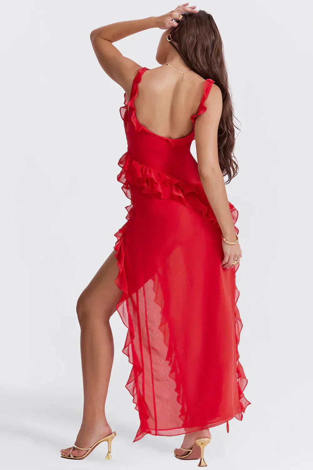 Back view of the red Sylvia Ruffle Maxi Dress, highlighting the low back and the tiered ruffles on the skirt.