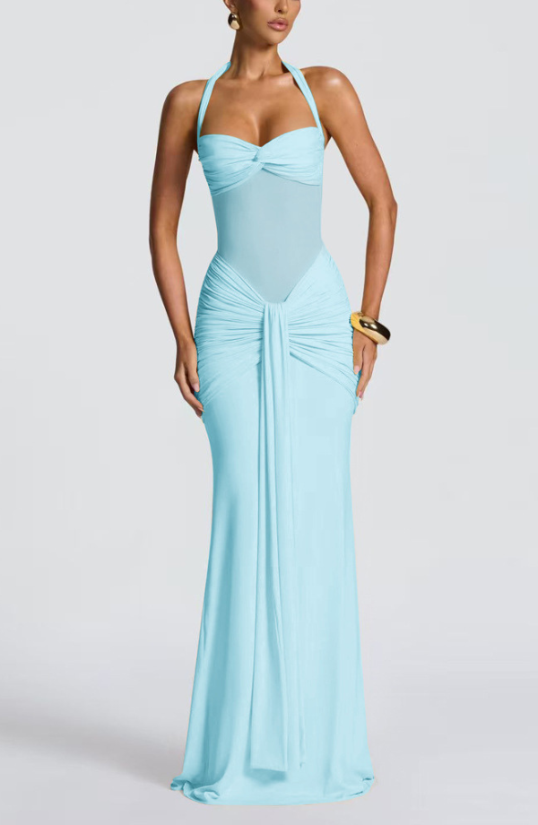 Light blue Victoria ruched maxi dress, featuring a twisted halter top and flattering ruching on the skirt, a unique suit dress.