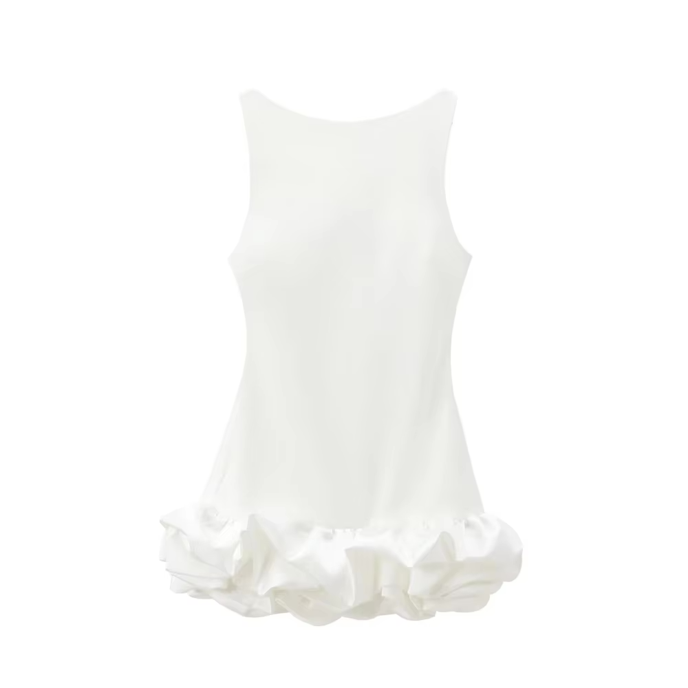 Front view of a white Vienna Rosette Mini Dress with a sleeveless design and ruffled hem.